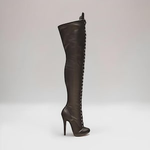 “Classic lace-up round toe knee boots with high 14cm stiletto heel for fashion styling, side view.”