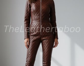 May include: A brown leather jumpsuit with a quilted pattern. The jumpsuit has a zipper closure and long sleeves. The text "The Leathertaboo" is printed on the front of the jumpsuit.