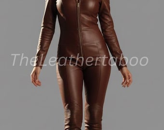 May include: Brown leather jumpsuit with a zip-up front and ribbed shoulder and knee details. The text "The Leathertaboo" is printed on the front. The jumpsuit has long sleeves and a stand-up collar.