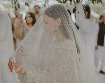 White Bridal Veil - Pearls beaded and sequins all over the wedding dupatta.