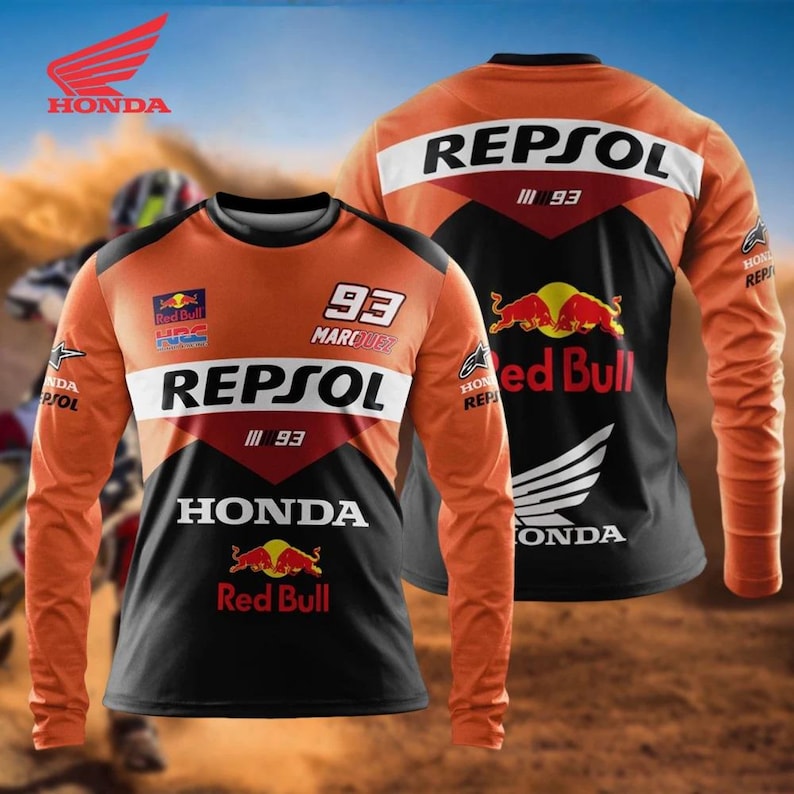 May include: Orange and black long-sleeve shirt featuring the Honda and Repsol logos, along with Red Bull branding. The number 93 is prominently displayed. The shirt has a color block design with white accents.