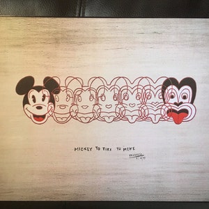 May include: A red and black line drawing of Mickey Mouse morphing into a Tiki mask. The image is on a woodgrain background with the text "Mickey to Tiki Tu Meke" and a signature.