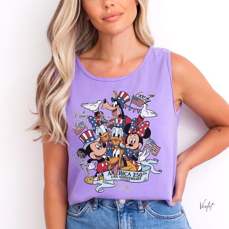 May include: A light purple sleeveless tank top featuring a graphic print of Disney characters including Mickey Mouse, Minnie Mouse, Donald Duck, Daisy Duck, Goofy, and Pluto wearing patriotic hats, with the text America 250th USA Anniversary 1776-2026.
