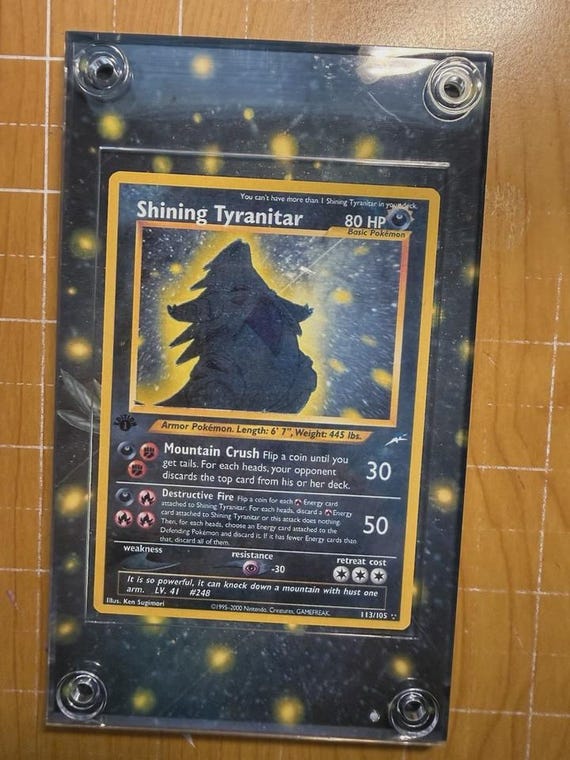 shining tyranitar pokemon card One of the most legendary cards I've done. The Holo shift Error shining is done. I think the white/blue contrast on it makes it loom so cool. The holo shift style setup or your main portfolio Pokemon Neo Destiny Single Card