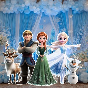 May include: A colorful party backdrop featuring characters from the animated film Frozen. The image includes cutouts of Anna, Elsa, Kristoff, Olaf, and Sven, set against a blue and white winter-themed background with snowflakes and balloons.