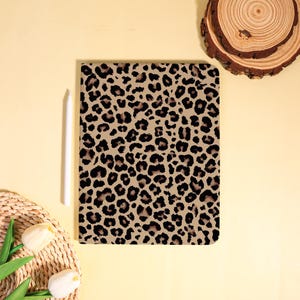 May include: A rustic wooden sign with the text "Welcome to our home" in white lettering. The sign features a distressed finish and a simple, inviting design, perfect for entryway decor.