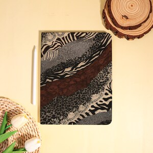 May include: A rustic wooden sign with the text "Welcome to our home" in white lettering. The sign features a distressed finish and a simple, inviting design, perfect for entryway decor.