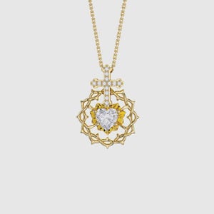 May include: A gold-colored pendant necklace featuring a cross with embedded clear stones above a heart-shaped clear stone. The heart is surrounded by a gold-colored floral design. The necklace chain is also gold-colored.