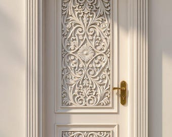 May include: A white wooden door with intricate floral carvings. The door features a decorative panel with a sunburst design and a brass handle. The door is framed by white molding and columns, with small green bushes on either side.