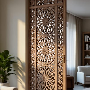 May include: A wooden sliding door with detailed floral carvings. The door is made of light-coloured wood and features three large circular designs with petal patterns. The door is open, revealing a glimpse of a living room.