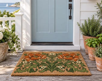 May include: A rectangular coir doormat featuring a symmetrical botanical print of large orange poppy flowers and intricate green foliage with small white blossoms, centered on a natural tan fiber background.