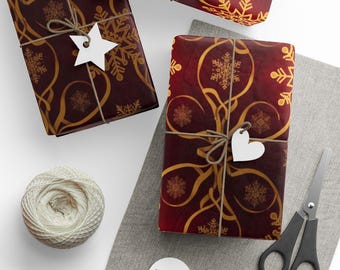 Papel de regalo navideño elegante, copos de nieve dorados, papel de regalo color burdeos