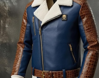 May include: A blue leather jacket with brown crocodile-textured sleeves and belt. The jacket features a white shearling collar and a small skull emblem. Gold zippers and a white ribbed cuff complete the design.