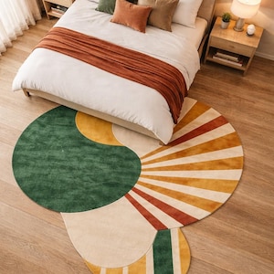 以下が含まれることがあります： 黒い持ち手と「But First, Coffee」の文字が黒い手書き風フォントで書かれた白いセラミックマグ。マグは白い表面に置かれています。