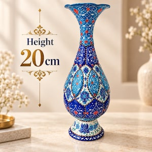 May include: A tall, slender vase with a flared, scalloped rim, featuring intricate blue, white, and red floral patterns across its surface. The vase stands 20 cm in height, as indicated by the text printed clearly to its left side.