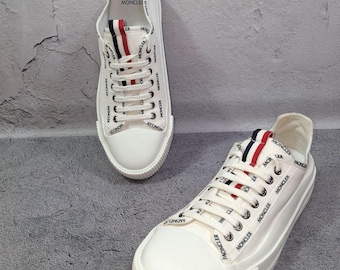 Zapatillas Moncler Glissiere blancas con suela acanalada y ribetes de logotipo, talla 44 UE/10 EE. UU.