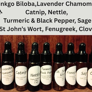 May include: A collection of eight small amber glass bottles with black droppers, each labeled with a different herbal extract name. The labels include "Ginkgo Biloba," "Lavender Chamomile," "Catnip," and more. The text "5 ml" is visible on the bottles.