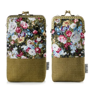 May include: Two green floral print fabric coin purses with a gold metal clasp and a brown woven fabric bottom. The purses have the word "Shushou" printed on the side.