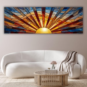 May include: A rectangular wall art piece featuring a stained glass design of a rising sun. The sun is a bright yellow semicircle at the bottom center, with rays of orange, red, and deep blue glass segments radiating outward across the entire panel.