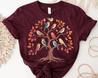 木にとまる鳥のグラフィックTシャツ：カラフルな小鳥のシャツ、自然愛好家へのギフト