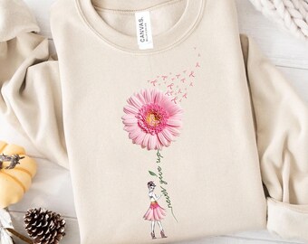 Breast Cancer Awareness-sweater: roze lintbloem, geef nooit op