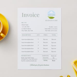 May include: A light gray invoice with the word "Invoice" at the top. The document includes fields for client information, a logo, and a table with descriptions, quantities, prices, and totals. The invoice also includes payment information and a thank you message.