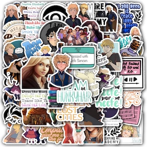 May include: A collection of colorful stickers featuring illustrations of characters and quotes. The stickers include images of people, text like "Team Keefe", "Hunkyhair", and "Lost Cities", and various other designs. These stickers are likely themed around a book or series.