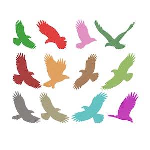 May include: A collection of colorful eagle silhouettes in various shades, including green, red, pink, and brown, against a white background. The eagles are depicted in flight, with their wings spread. The image is suitable for crafts and design projects.