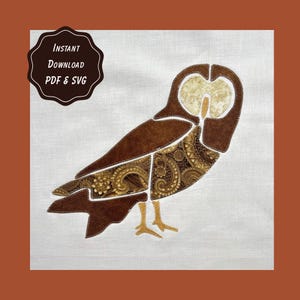 May include: A fabric applique of an owl on a white background, featuring brown solid fabric and brown fabric with a gold paisley pattern. The owl has a cream-colored face and yellow feet. A dark brown badge reads: Instant Download PDF & SVG.