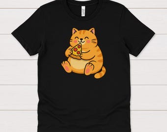 May include: Black t-shirt featuring a cartoon orange tabby cat holding a slice of pizza. The cat has a happy expression and is sitting down. The pizza slice has pepperoni and cheese. The shirt is made of a soft material.