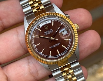 Ricoh president automatic day/date men’s wrist watch