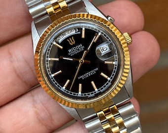 Ricoh president automatic day/date men’s wrist watch