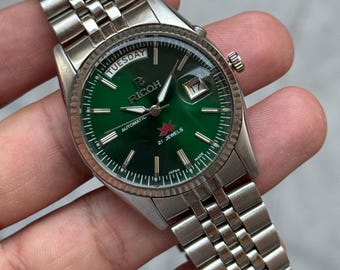 Ricoh president automatic day/date men’s wrist watch