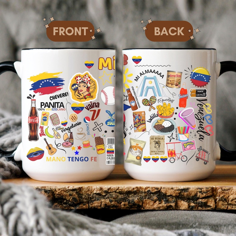 May include: A white ceramic mug with black handle and rim, featuring a colorful design with text and illustrations. The front side says "PANITA 100% VENEZOLANO" and "MANO TENGO FE". The back side says "VENEZUELA".