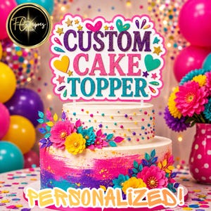 May include: A two-tier cake decorated with colorful brushstrokes of pink, purple, and blue, topped with paper flowers and a glittery sign that reads CUSTOM CAKE TOPPER, surrounded by vibrant balloons and confetti in a festive setting.