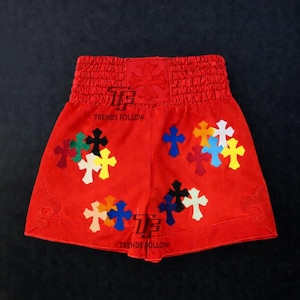 Pantalones cortos de boxeo personalizados hechos a mano, estilo profesional, para entrenamiento de boxeo, con cruces multicolores.