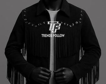 May include: Black suede jacket with fringe detailing across the chest and sleeves. The jacket features decorative eyelets along the collar and the text "TRENDS FOLLOW" in white. The jacket is displayed on a mannequin.
