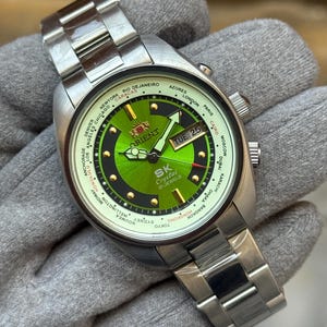 orient crystal 21 jewels world time automatic day/date mens wrist watch