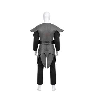May include: A gray sleeveless tunic with structured shoulder caps and a black belt, worn over a black long-sleeved shirt and black trousers. The tunic features a layered, pointed hemline that extends down the back, creating a distinct silhouette.