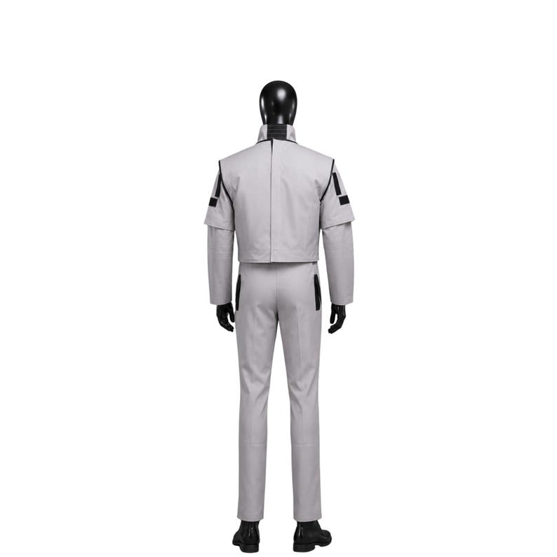 May include: A light gray costume consisting of a cropped jacket with black accents on the shoulders and sleeves, matching pants, and black gloves and boots. The outfit is displayed on a mannequin.