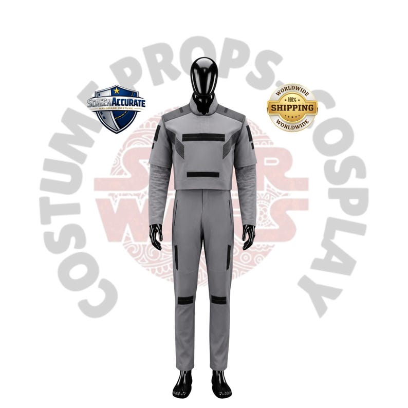 May include: A gray cosplay costume displayed on a mannequin. The costume includes a cropped jacket with dark gray accents, matching pants, and long sleeves. The words "COSTUME PROPS" and "SCREEN ACCURATE" are visible.