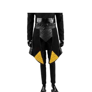 May include: Black costume with a leather belt and accents. The costume features a long-sleeved top, pants, and a decorative skirt with yellow and black details. The belt has a quilted pattern.
