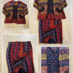 May include: A vintage two-piece set featuring a jacket and a skirt. The jacket is open-front with a mix of patterns in red, yellow, and blue. The skirt has a similar pattern with a wrap design. The set is displayed on a light wood surface.
