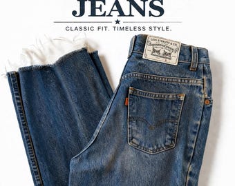 Jeans Levi’s California Straights vintage desgastados con bajo sin rematar, lavado medio, años 90