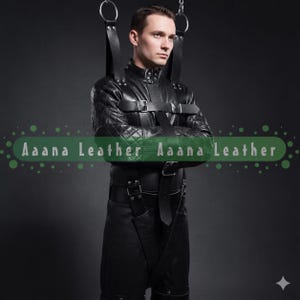 May include: A black leather restraint suit featuring quilted sleeves, a high collar with metal hardware, and multiple adjustable buckled straps. The garment includes integrated shoulder straps attached to overhead metal rings. Text reads Aaana Leather.