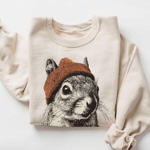 Sudadera unisex vintage con ardilla retro y gorro de lana