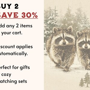 May include: An illustration of two raccoons in a snowy forest setting. The image includes text that reads "BUY 2 SAVE 30%" and "Add any 2 items to your cart. Discount applies automatically."