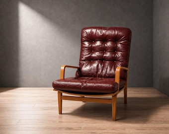 Ingrid High‑Back Armchair by Bruno Mathsson for DUX – Burgundy Leather, Beech Frame