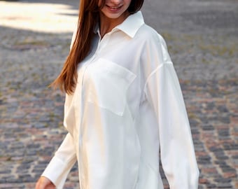 White women’s 100% Tencel shirt. Relaxed fit, hidden placket, back yoke