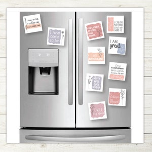 May include: A set of 10 motivational quote refrigerator magnets with floral accents. The magnets are printed on white paper with a pink, blue, and gray watercolor background. The quotes include "I can do this, I will do this, I am doing this", "I have come so far", "I am capable of doing hard things", "I am important", "I am great", "Every accomplishment starts with the decision to try", "Never give up, never give up", "I believe in myself", and "I will try again."